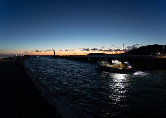 Fishing boats departing